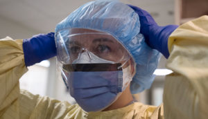 Nurse with personal protective equipment.